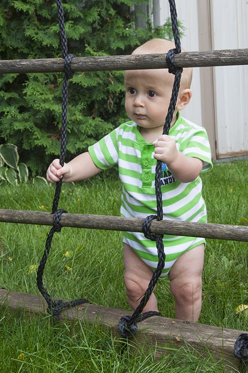 Standing at the Playhouse Ladder